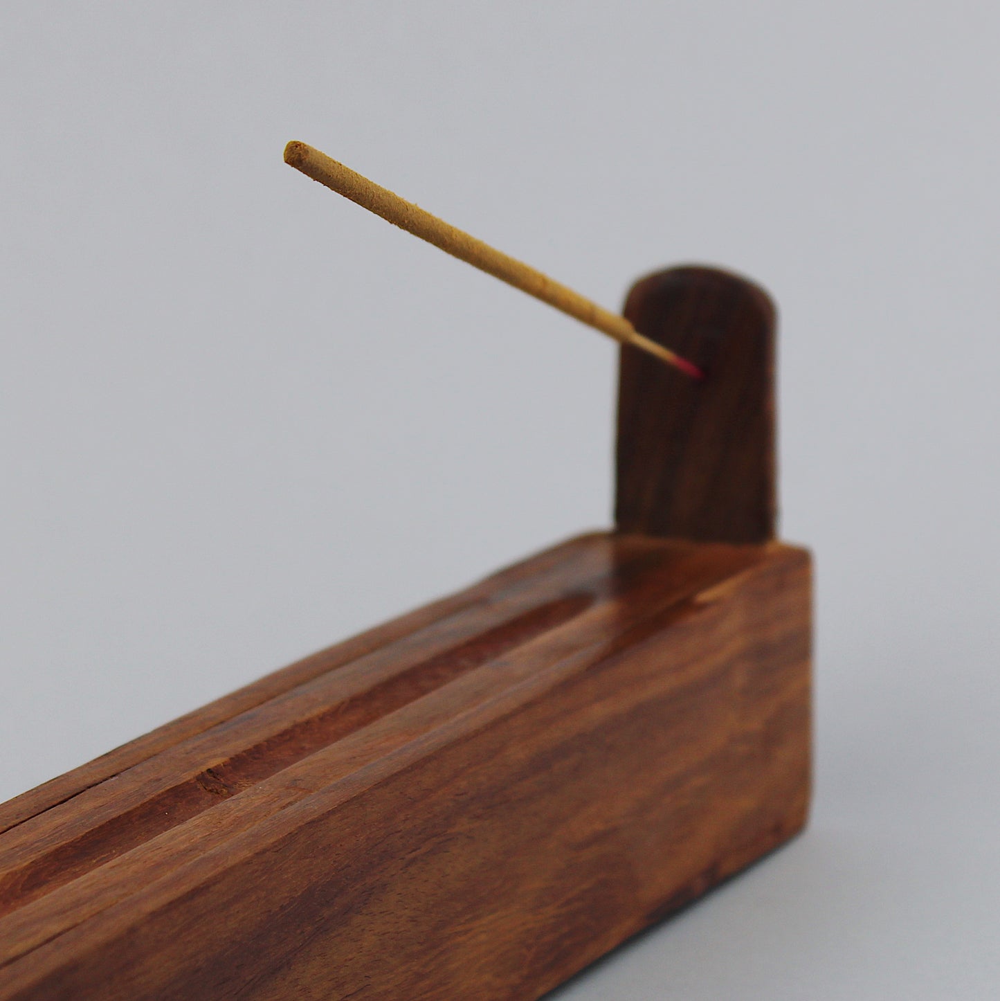 Wooden incense holder for incense sticks with storage compartment